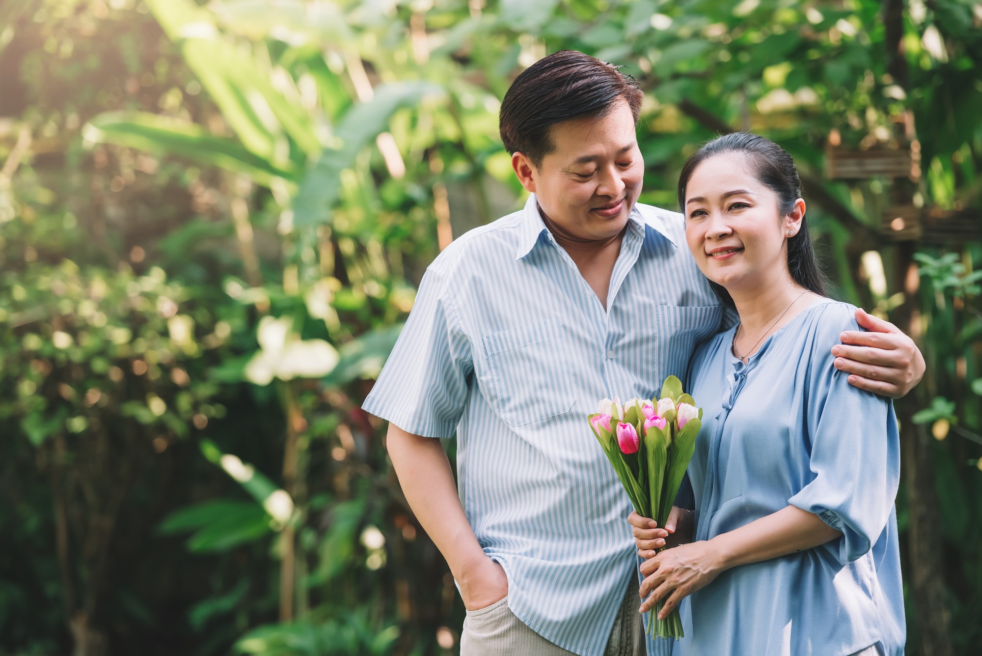 Portrait asian couple in the garden